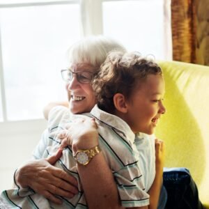 Grandma and grandson hugging together